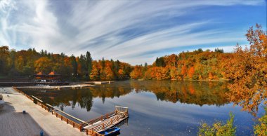 The Bear Lake in the autumn in Sovata, Romania clipart