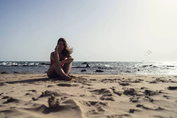 Pretty Female Sitting Rota Beach Spain Wearing Swimsuit Windy Day — Stock Photo, Image