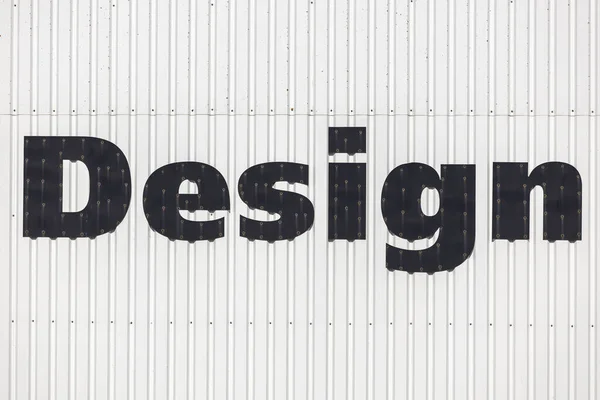Closeup Letras Grandes Formando Design Palavra Branco Branco Parede Ferro — Fotografia de Stock