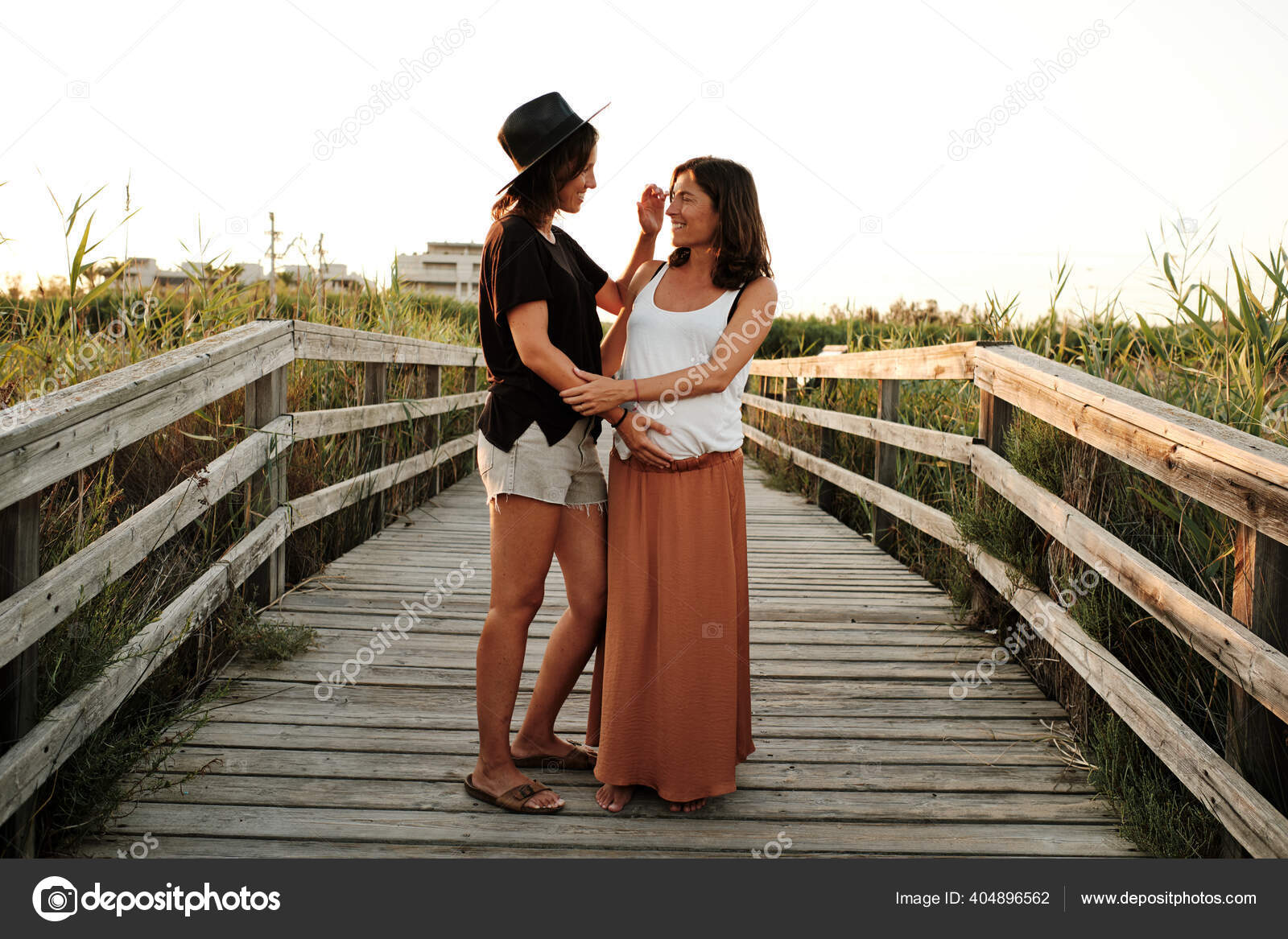Mesmerizing Shot Lovely Pregnant Couple Lesbian Family Concept Stock Photo by ©Wirestock 404896562 Mesmerizing Shot Lovely Pregnant Couple Lesbian Family Concept Stock Photo by ©Wirestock 404896562