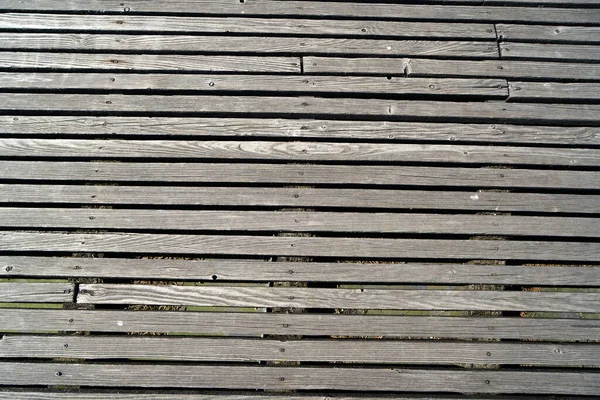 Nahaufnahme Eines Geschlitzten Holzfußbodens — Stockfoto