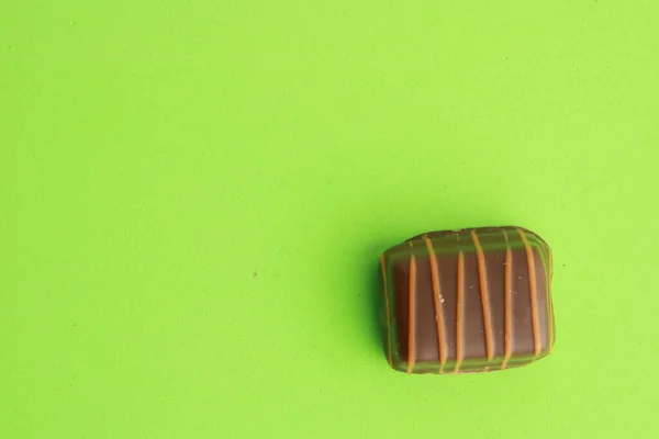 Una Vista Superior Del Delicioso Chocolate Bélgica Sobre Fondo Verde —  Fotos de Stock