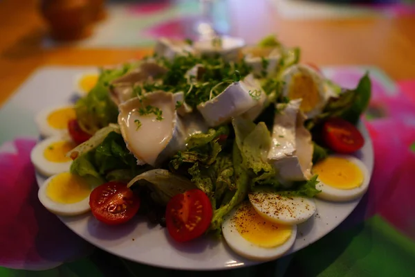 Closeup Delicious Salad Boiled Eggs Goat Cheese Vegetables Plate Table — Stock Photo, Image