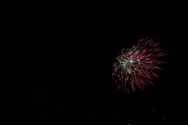 Beautiful Shot Exploding Red Green Fireworks Black Night Sky Background — Stock Photo, Image