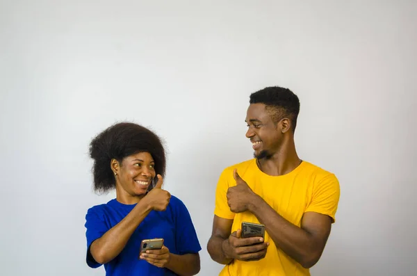 Cute African Couple Giving Thumbs Each Other Smiling — Stock Photo, Image