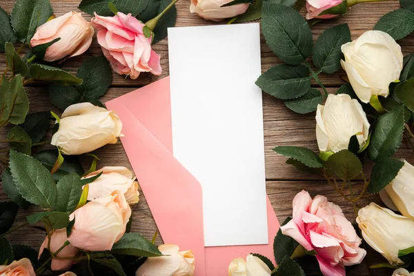 Top View Envelopes Surrounded Roses Wooden Surface — Stock Photo, Image