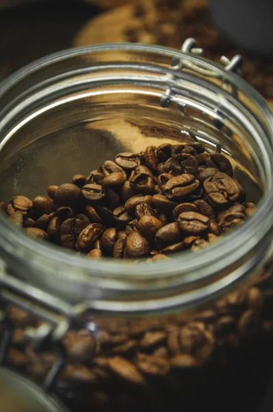 Closeup Glass Jar Roasted Coffee Beans — Stock Photo, Image