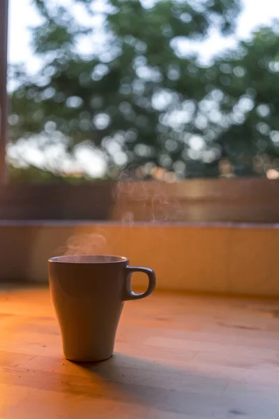Closeup Shot Tea Cup Hot Drink Placed Table Orange Light — Stock Photo, Image