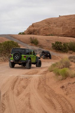 MOAB, UNITED STATES - Aug 02, 2020: A weekend in Moab, UT driving Jeeps offroad. clipart