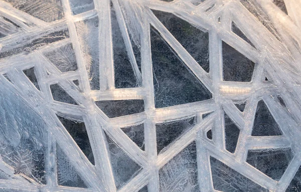 様々な三角形の抽象的なテクスチャを持つ氷床のクローズアップショット — ストック写真