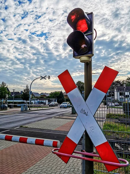 NORDERSTEDT, GERMANY - Aug 05, 2020: barrier red traffic sign danger train st. andrew\'s cross transport symbol railway signal street railroad stop travel traffic light traffic sign cross