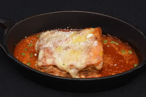 Closeup Shot Lasagna Piece Bowl Tomato Sauce — Stock Photo, Image
