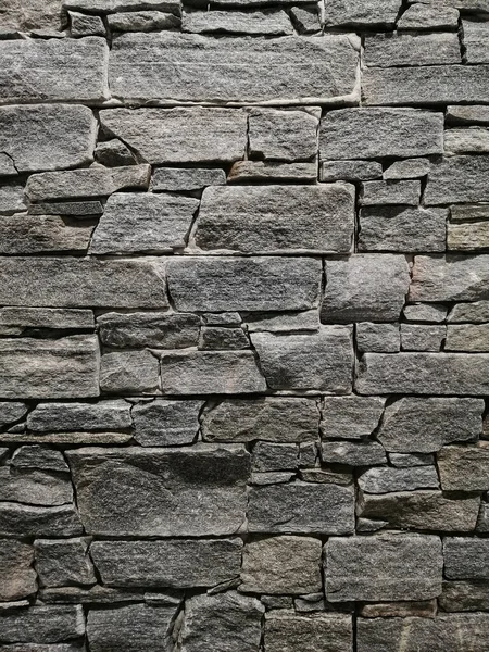 Вертикальный Снимок Абстрактной Каменной Стены — стоковое фото