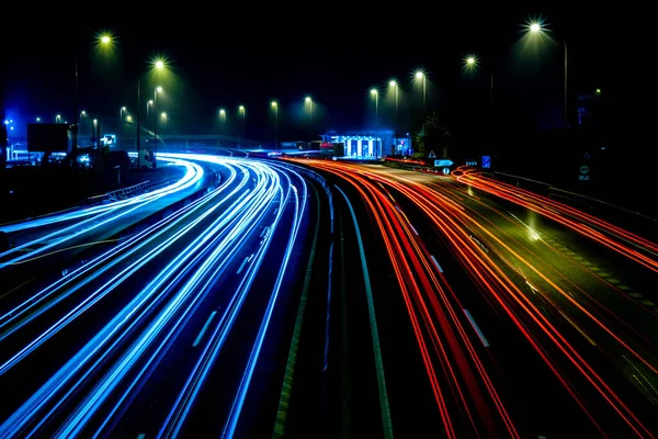 A shot of long exposure of lights over a highway at night in Madrid