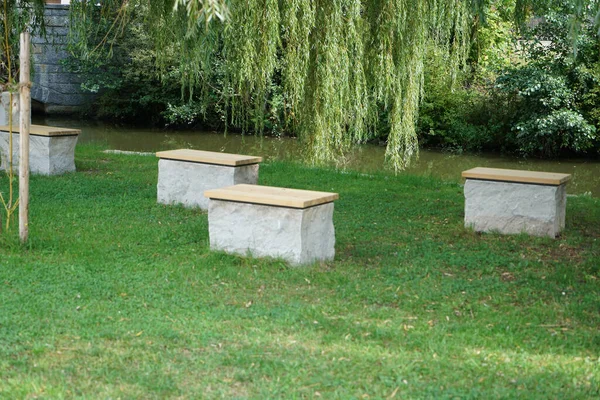 Few Concrete Benches Creek Park Willow Trees — Stock Photo, Image