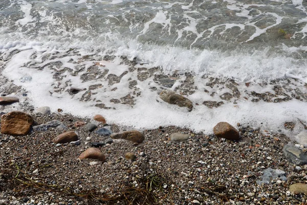 Een Close Shot Van Kiezelstenen Door Zee — Stockfoto