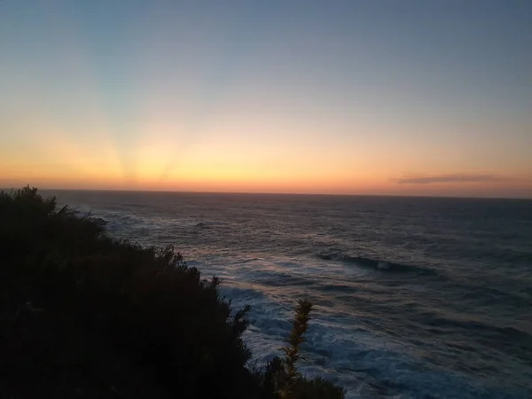 Una Hermosa Toma Una Playa Durante Una Puesta Sol — Foto de Stock