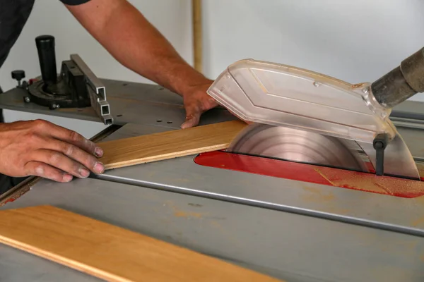 Closeup Shot Worker Cutting Parquet Manually Circular Saw — Stock Photo, Image