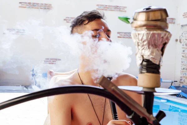 Young Male Smoking Hookah Next Pool Summer — Stock Photo, Image