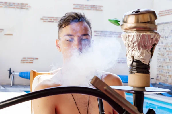 Young Male Smoking Hookah Next Pool Summer — Stock Photo, Image