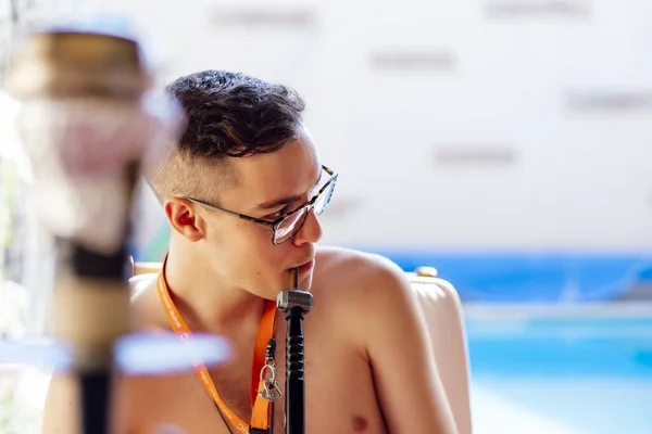 Young Male Smoking Hookah Next Pool Summer — Stock Photo, Image