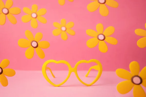 Pair Yellow Heart Shaped Glasses Pink Floral Background Stock Picture