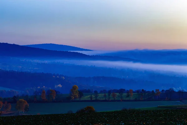 Fog Covering Valley Late Evening Stock Picture