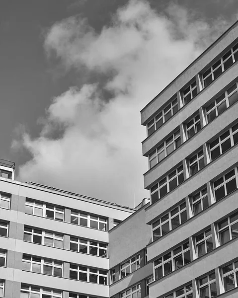 Grayscale Shot Modern Buildings Cloudy Sky Daytime Royalty Free Stock Photos
