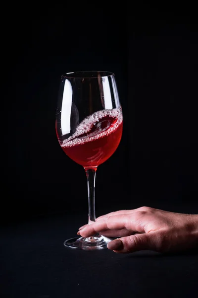 Vertical Shot Female Hand Touching Glass Red Wine Black Background — Stock Photo, Image
