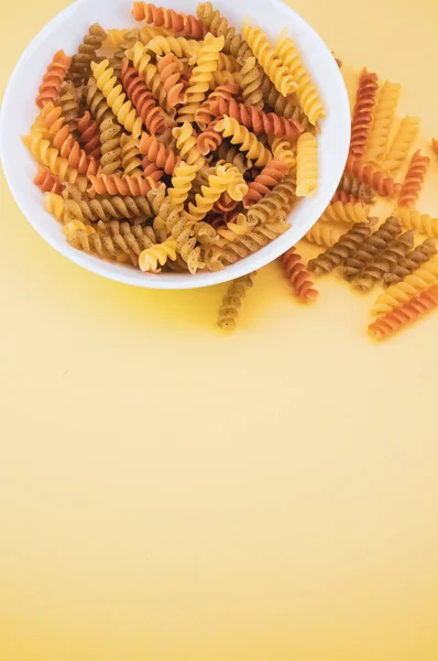 Fusilli Pasta Bowl Yellow Surface — Stock Photo, Image