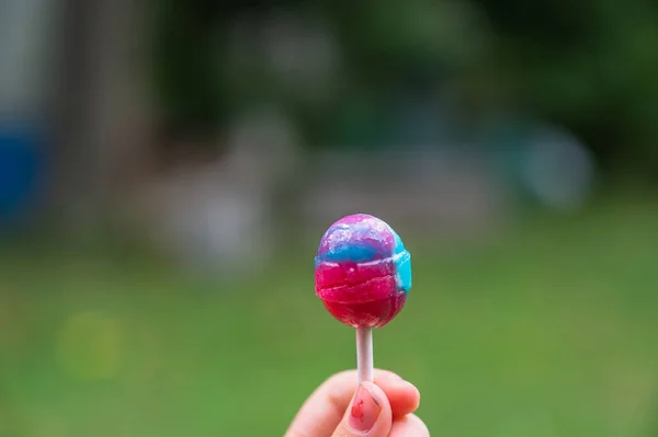 Selective Focus Closeup Lollipop Candy Held Person Hand — Stock Photo, Image