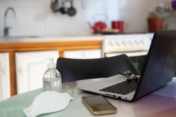 Selective Focus Shot Hand Sanitizer Medical Mask Working Desk — Stockfoto