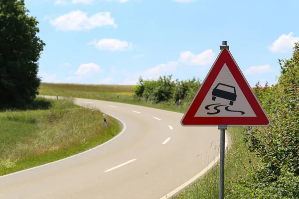 Slippery Road Road Sign Stands Sharp Turn — Stock Photo, Image