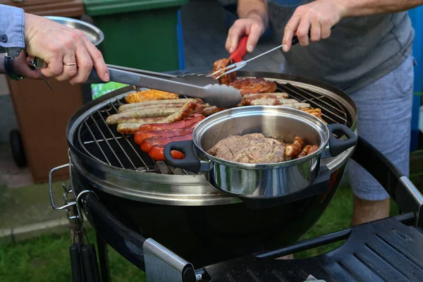 Closeup People Grilling Sausages Steak Outdoor Grill Garden Daytime — Stock Photo, Image