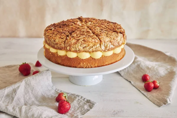 Closeup Shot Delicious Vanilla Cream Cake Strawberries White Table Background — Foto de Stock