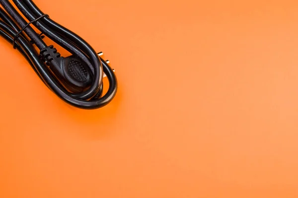 Cabo Alimentação Preto Fundo Laranja — Fotografia de Stock