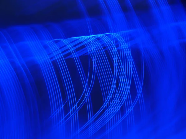 Ένα Αφηρημένο Φόντο Μπλε Ρυθμικό Φως Μονοπάτια — Φωτογραφία Αρχείου