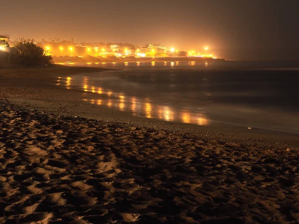 Illuminated Coastline Dark Sea — Stock Photo, Image