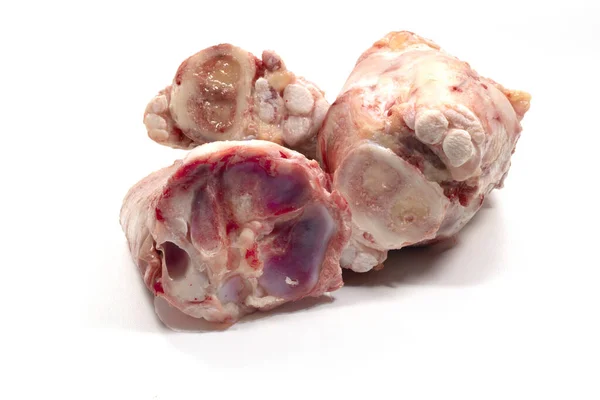 A closeup shot of veal shank bones isolated on a white background
