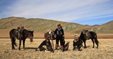 ULGII, MONGOLIA - Sep 18, 2019: Golden eagle festival, Eagle festival Mongolia, Mongolian festival, golden eagle, eagle hunters, mongolian eagle hunters, falconer, mongolian sport clipart