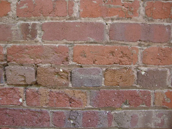 Pionowe Zbliżenie Strzał Starej Czerwonej Cegły Ściany Jako Tło — Zdjęcie stockowe