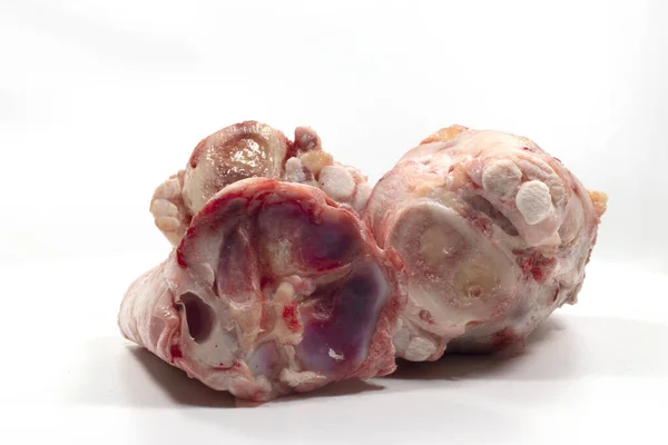 A closeup shot of veal shank bones isolated on a white background