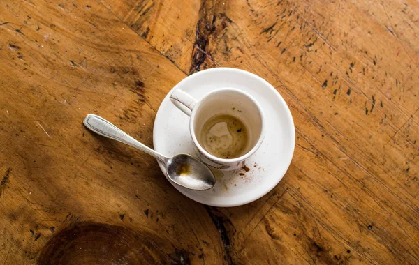 Una Taza Café Sucio Vacío Con Una Cuchara — Foto de Stock