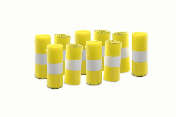Montón Rollos Bolsa Reciclaje Plástico Amarillo Aislados Sobre Fondo Blanco —  Fotos de Stock