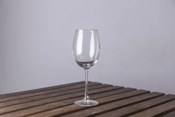 Empty Glass Goblet Wooden Table White Background — Stock Photo, Image