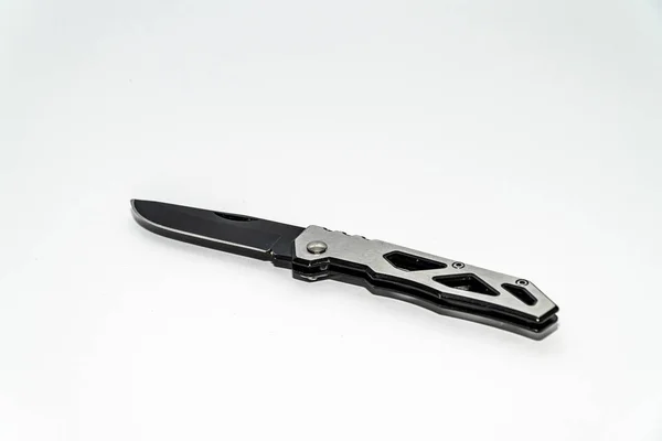 Ein Taschenmesser Aus Edelstahl Mit Schwarzer Klinge Isoliert Auf Weißem — Stockfoto
