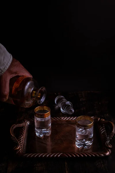 Vertical Shot Hand Filling Glass Vodka Decanter — Stock Photo, Image