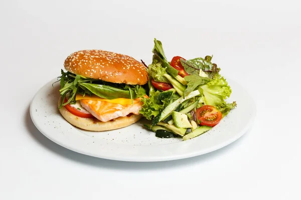 burger with salmon and vegetables