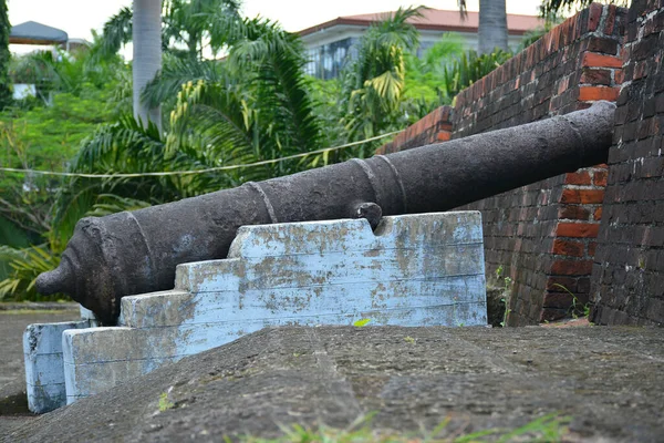 Old cannon ball defense for war artillery display during Spanish era in Philippines