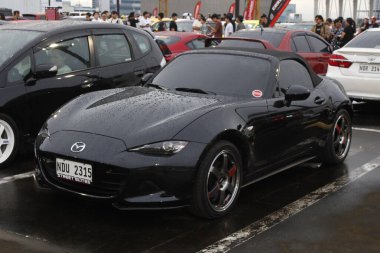 QUEZON CITY, PH - SEPT 20 - Mazda mx5 miata 20 Eylül 2025 tarihinde Quezon City, Filipinler 'de Çocuklar Suçlanmasın Projesi' nde. DBTK Projesi, Filipinler 'de düzenlenen bir otomobil buluşması..